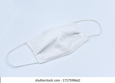 White Cloth Mask For Protection Against Viruses Covid-19