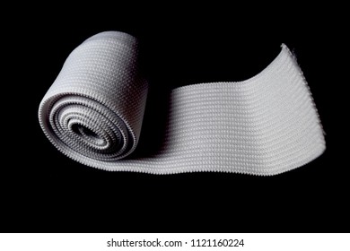 White Cloth Ribbon On Black Background. Close Up Of Sewing Elastic Band