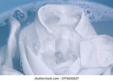 White Clothing In Suds, Top View. Hand Washing Laundry