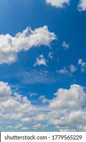 White Cloud Fluffy On Blue Sky Daylight Vertical