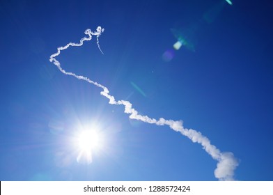 White cloud leaved by Epsilon rocket, launched from Uchinoura Space Center, Japan - Powered by Shutterstock - Get 15% off with code: PIKWIZARD15