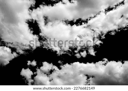 White cloud on a black background. Dramatic clouds. Black and white atmospheric pattern. Brush base