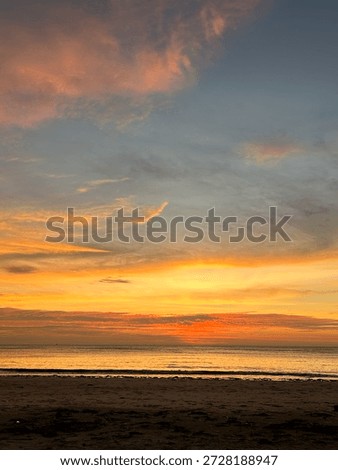 White cloud with orange cloud. The sun is setting mixing altogether