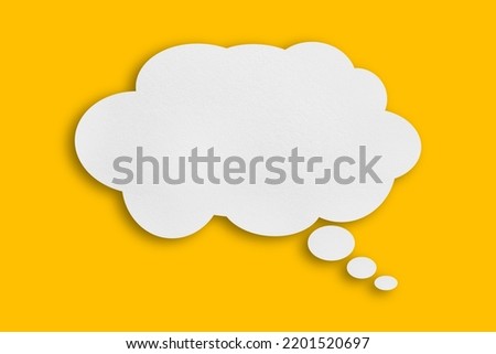 white cloud paper speech bubble shape against yellow background design