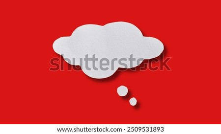 White cloud paper speech bubble shape for design in your work business concept. Minimalist speech bubbles on red background. 