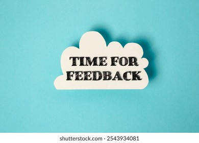 White cloud with the words time for feedback written in black. Concept of urgency and importance, as if the viewer needs to provide feedback quickly