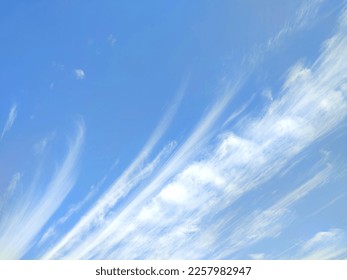 White clouds in the blue sky - Shutterstock ID 2257982947