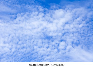 White clouds in the bright blue sky