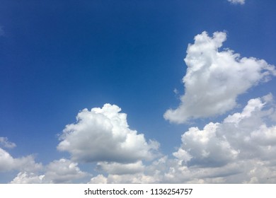 White Clouds Disappear In The Hot Sun On Blue Sky. Clouds On Blue Sky Background. Weather Nature Blue Sky With White Cloud And Sun.