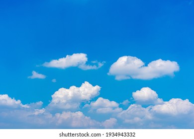 White clouds floating on blue sky background