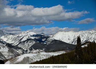 White Clouds Over Vail Ski Resort Mountains, Colorado USA