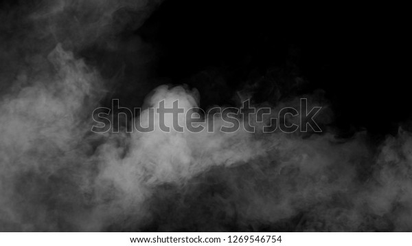 White clouds of vapor smoke are isolated on\
a black background. Gas explodes, swirl and dances in space. A\
magic fog dust texture effect that can be used by overlay and\
changing their\
transparency.