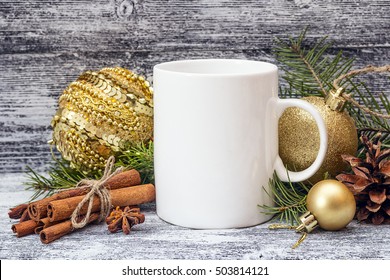 White Coffee Mug With Christmas Decorations And Cinnamon Sticks. Space For Text Or Design. Christmas Concept White Coffee Mug.