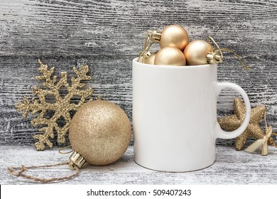 White Coffee Mug With Gold Shiny Christmas Decorations. Space For Text Or Design. Christmas Concept White Coffee Mug.