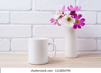 White Coffee Mug Mockup With Cosmos White And Pink Daisy Flowers.  Empty Mug Mock Up For Design Promotion.  