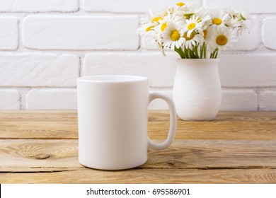 White Coffee Mug Mockup With White Field Chamomile Bouquet In Handmade Rustic Vase.  Empty Mug Mock Up For Design Promotion.  