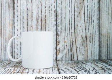 White Coffee Mug On Wood Background