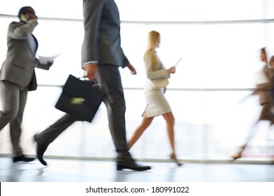 White collar workers hurrying to work at the beginning of working day - Powered by Shutterstock