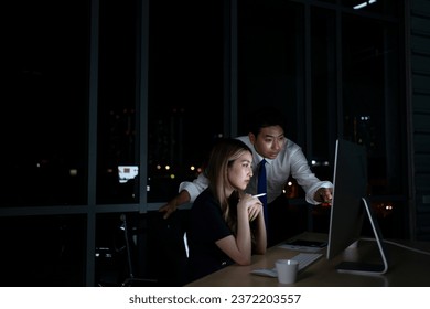 White collar workers working late at night. Occupation and working late concept. - Powered by Shutterstock