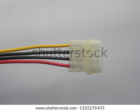 White color 4 pins hard drive connector cable on white background