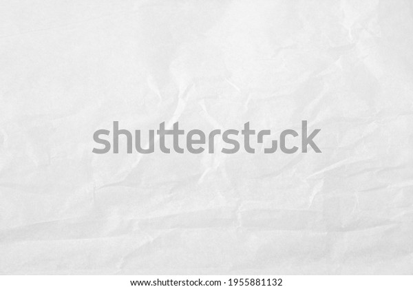 White color creased paper tissue\
background texture, wrinkled tissue paper\
texture.
