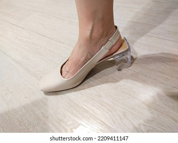 White Color And Glass Low Heel