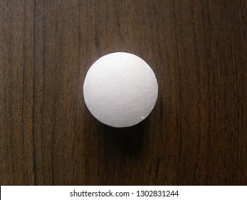 White Color Naphthalene Mothball On Wood Background