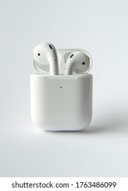White colour airpods with white background