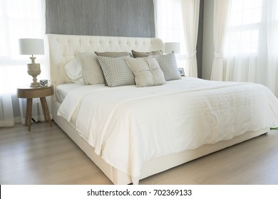 White Comfortable Bedroom With Lamp