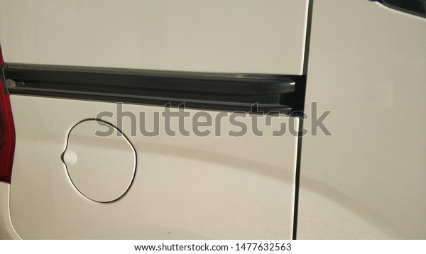 white\
commercial car, door slider and petrol tank\
cover