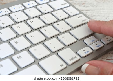 White computer keyboard with finger pushing blank key for mock up - Powered by Shutterstock