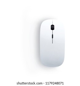 White computer mouse with pad on a wooden background, top view