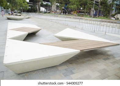 White concrete park bench in Modern style.