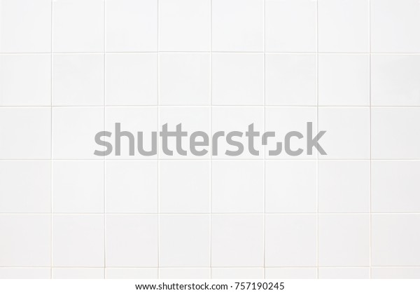 white concrete tile wall modern floors and textures\
Square Ceramic Mosaic Cube Pattern for Home Ideas Business And for\
decorating the bedroom. White rectangle mosaic tiles texture\
background. 