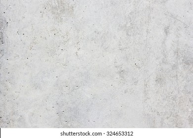 White concrete wall,Natural cement wall texture or old stone,retro-background wall texture. Concrete background gray suitable for use in classic design. Concrete loft style design ideas living home. 