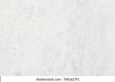 White concrete wall,Natural cement wall texture or old stone,retro-background wall texture. Concrete background gray suitable for use in classic design. Concrete loft style design ideas living home. 