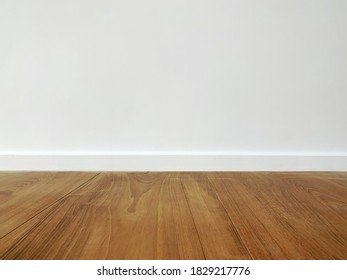 White concrete walls and brown teak floors. Concept for background and texture. - Shutterstock ID 1829217776