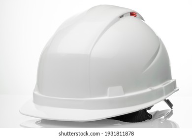 white construction worker's helmet on a white background with preserved paths