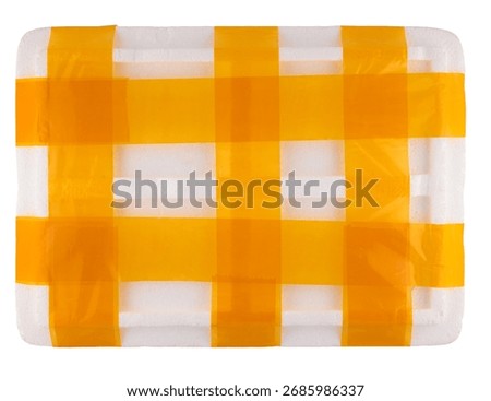 White container or box made of expanded polystyrene foam for packaging and transporting fragile and breakable goods, secured with yellow packing tape, close-up on white background, postal concept