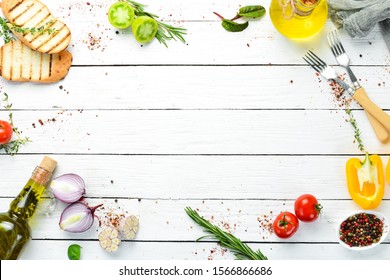 White cooking banner. Kitchen board with vegetables and spices. Top view. Free copy space. - Shutterstock ID 1566866686