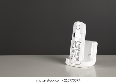 White Cordless Phone On White Table