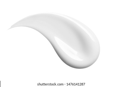 White cosmetic cream swipe isolated on white background. Make up foundation smudge. BB, CC cream smear texture