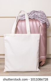 White Cotton Eco Tote Bag With A Travel Suitcase, Design Mockup. Handmade Shopping Bags