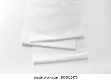 White Cotton Fabrics Swatches On Light Background. Textile Mockup