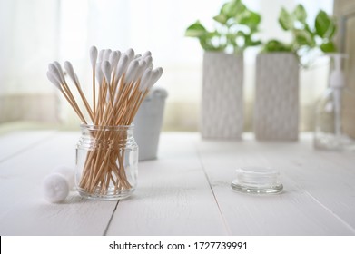 White cotton swabs cotton bud and cotton ball on clean background - Shutterstock ID 1727739991