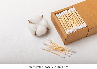 White cotton swabs on concrete texture background. Cotton buds. Bamboo cotton buds. Eco friendly. Hygienic cotton swabs for ears. Place for text. Place to copy. - Shutterstock ID 2312001729