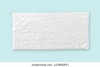 White Cotton Towel Mock Up Template Fabric Wiper Isolated On Blue Background With Clipping Path, Flat Lay Top View 