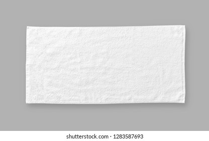 White cotton towel mock up template fabric wiper isolated on grey background with clipping path, flat lay top view 