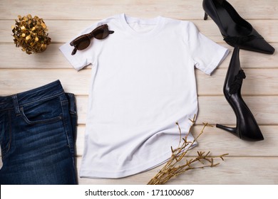 White Cotton T-shirt Mockup With Black High Heels Pointed Toe Women Pumps And Golden Plants. Design T Shirt Template, Tee Print Presentation Mock Up