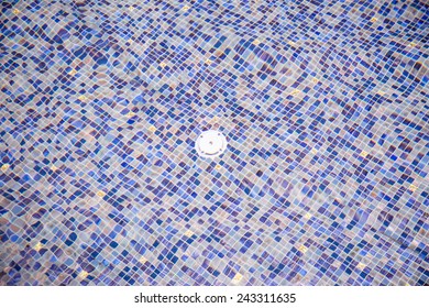 White Cover Drain Hole And Colorful Ceramic Floor In Swimming Pool 